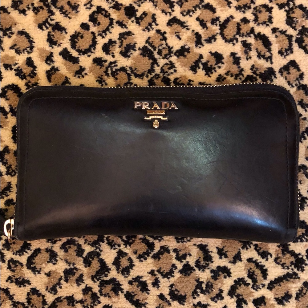Authentic Prada zip around wallet.